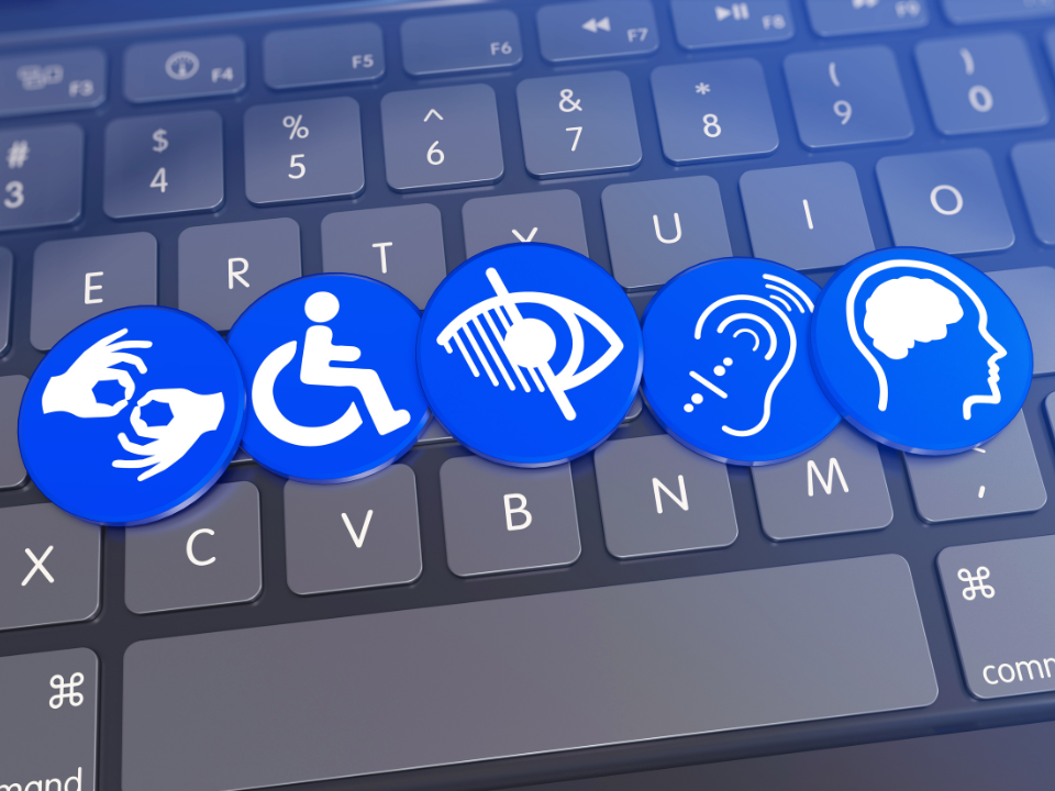 Un clavier num&eacute;rique avec des pastilles repr&eacute;sentant diff&eacute;rents types de handicap (handicap moteur, handicap visuel, handicap auditif, handicap mental)